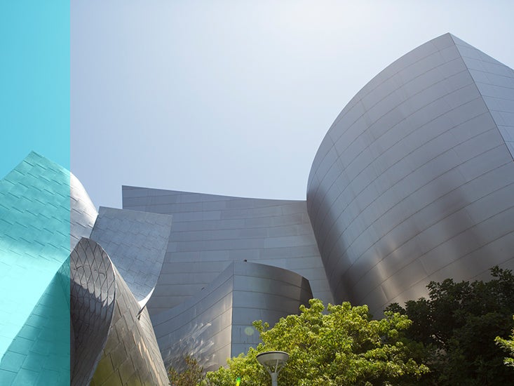 The Walt Disney Concert Hall cuts a unique profile against the blue sky.