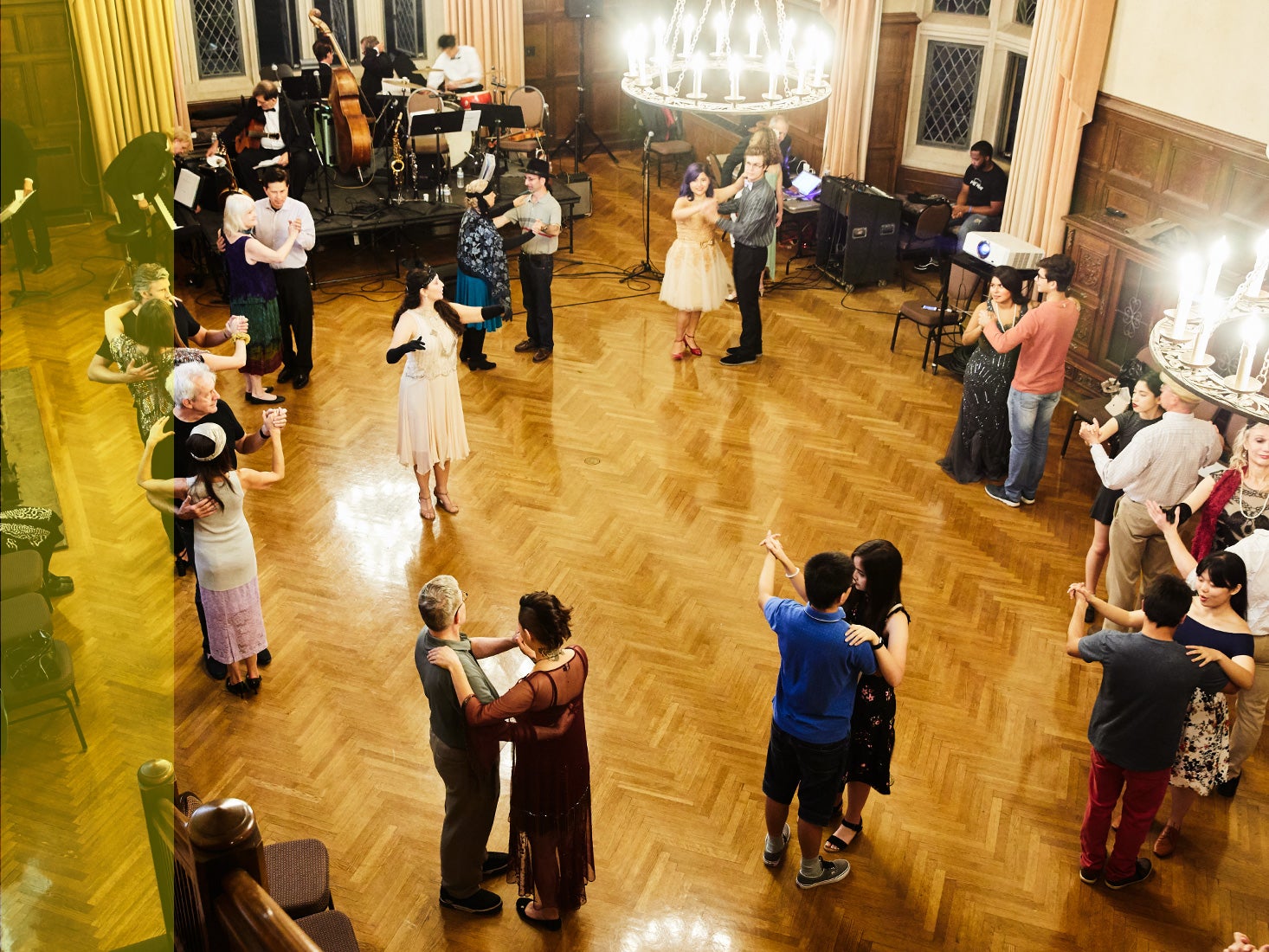 The Historical Ballroom Dance Club performs in a hall.