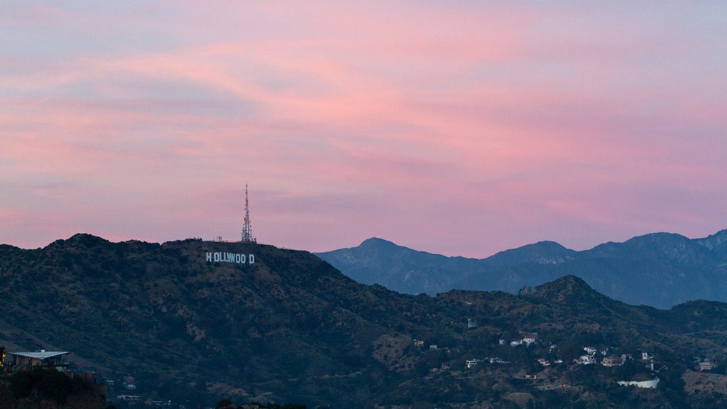 The Hollywood Sign can be seen by the light of a gorgeous sunset.